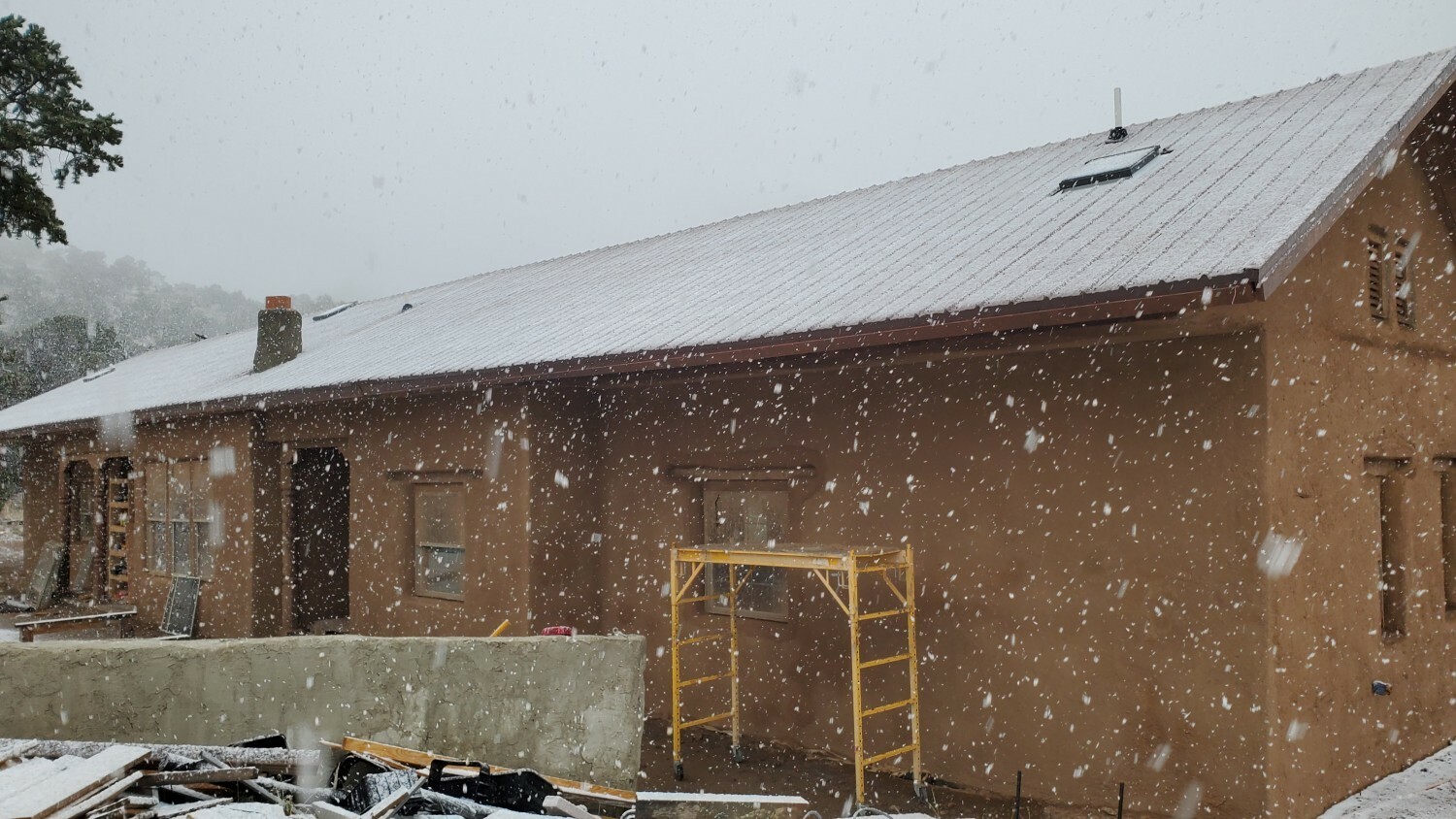 Snow on the metal roof Snow on the metal roof